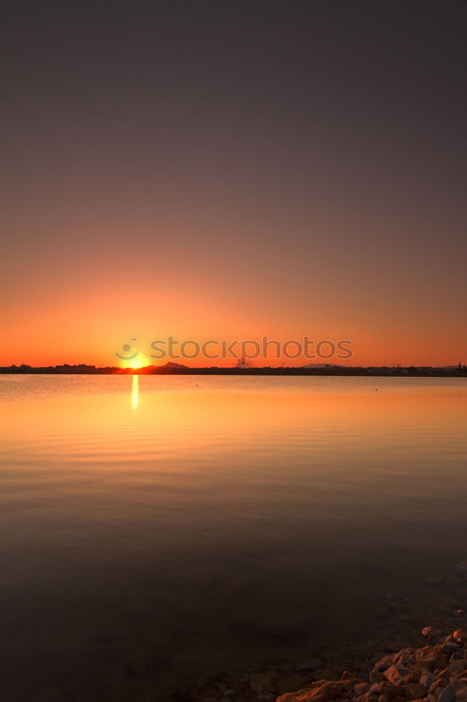 Similar – A bath in the sunset