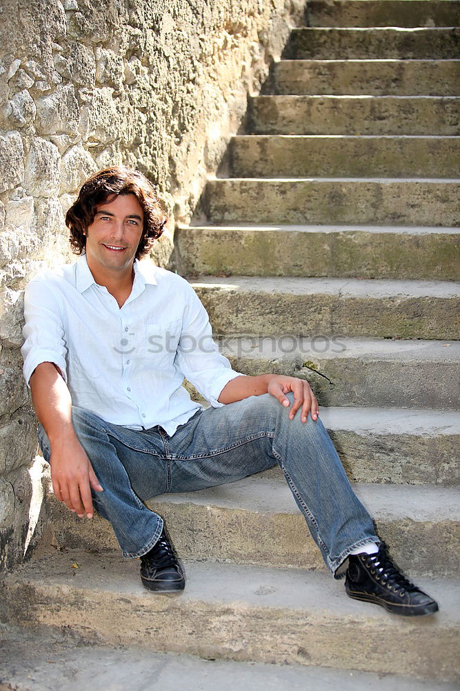 Image, Stock Photo Mature man sitting on steps in the street.