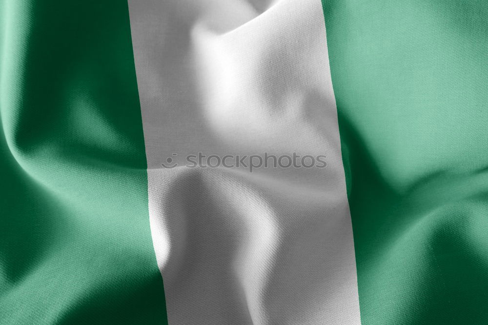 Similar – Nigerian flag in front of blue sky in the wind