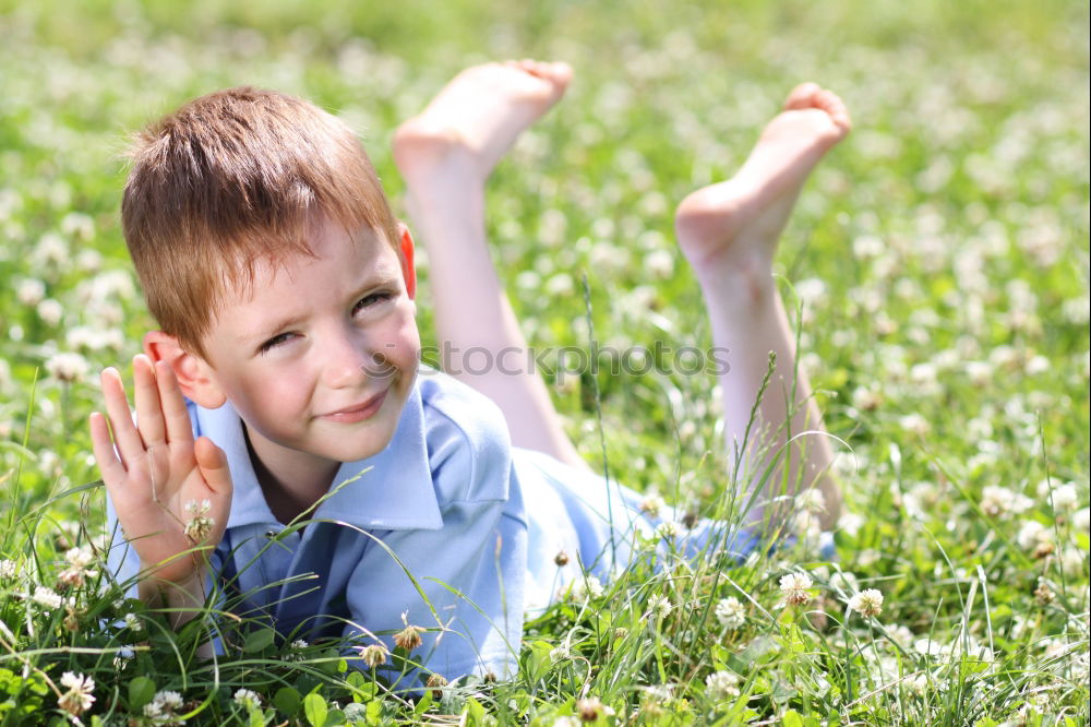 Similar – Image, Stock Photo smiling child sitting in field