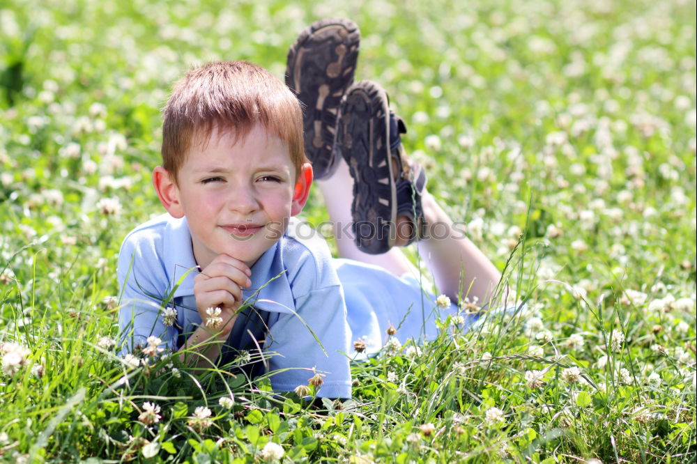 Similar – Cute child in the woods playing alone