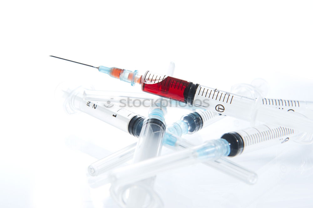 Similar – Medical syringe isolated over white background, injection]