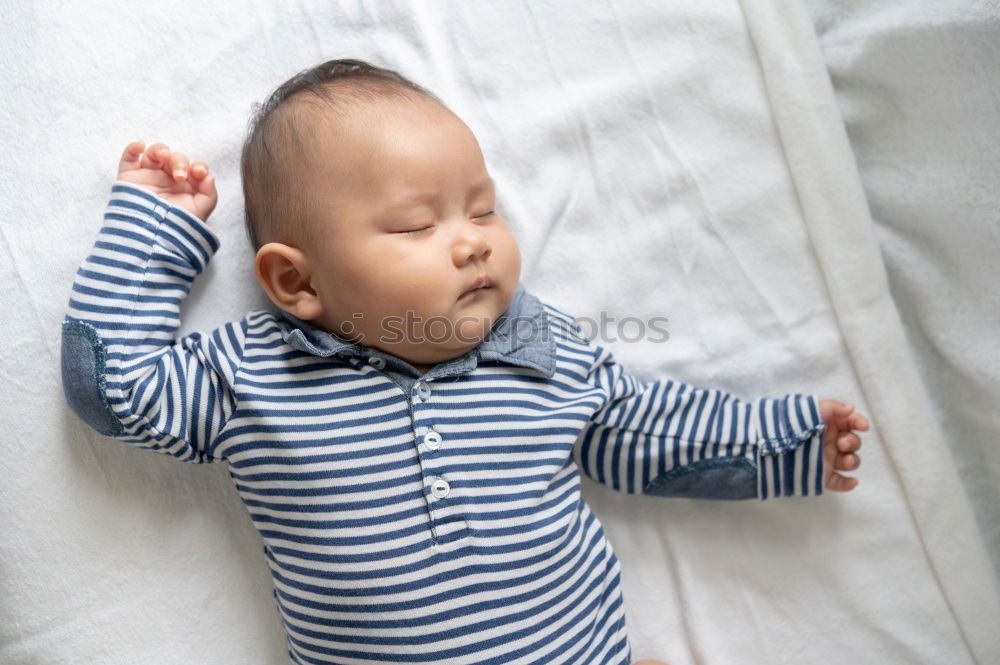 Similar – Newborn baby girl sleeping