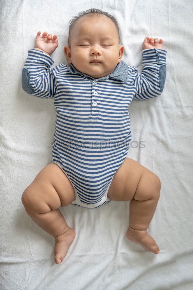 Similar – Image, Stock Photo Father and baby son playing on the bed. Concept of happiness.