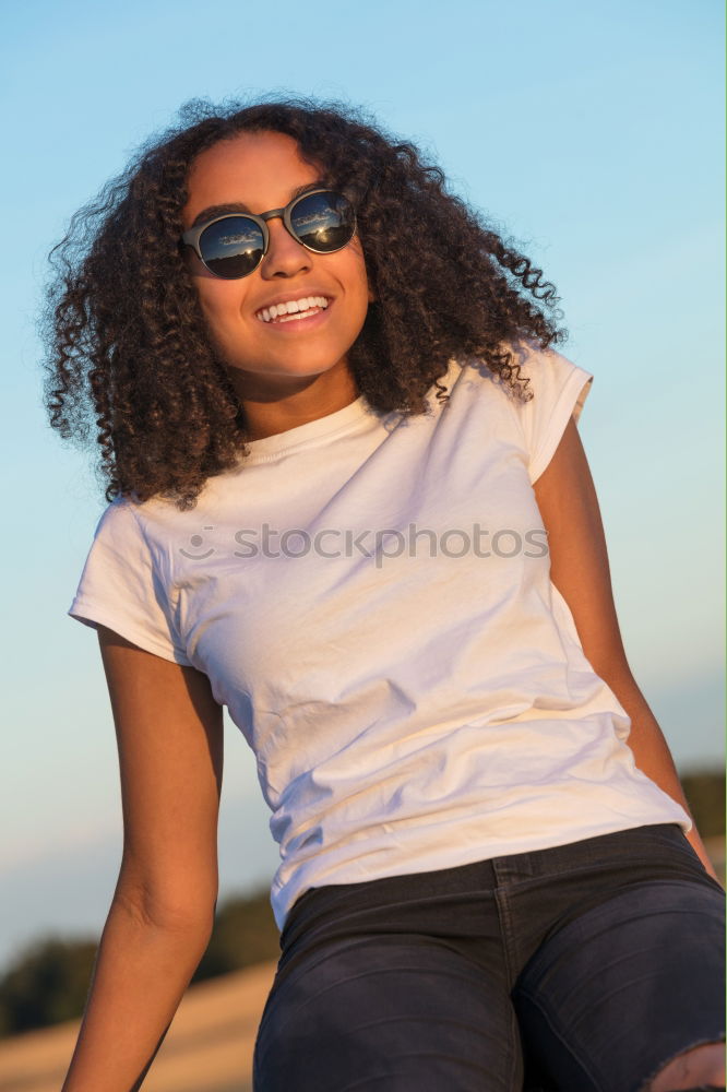 Similar – Young teen woman listening to music