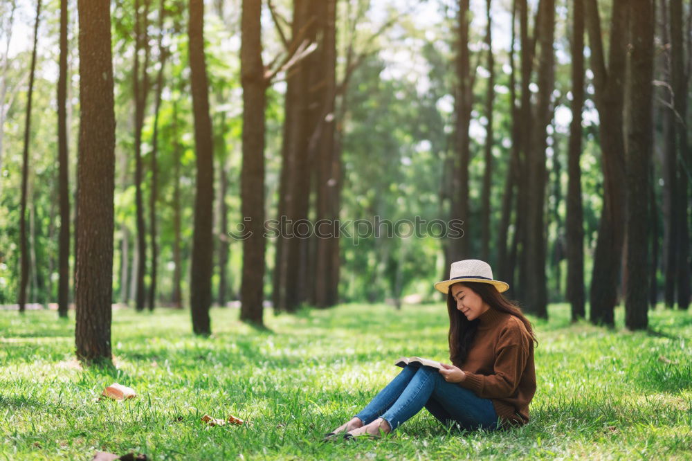 Similar – Sitting underneath a tree