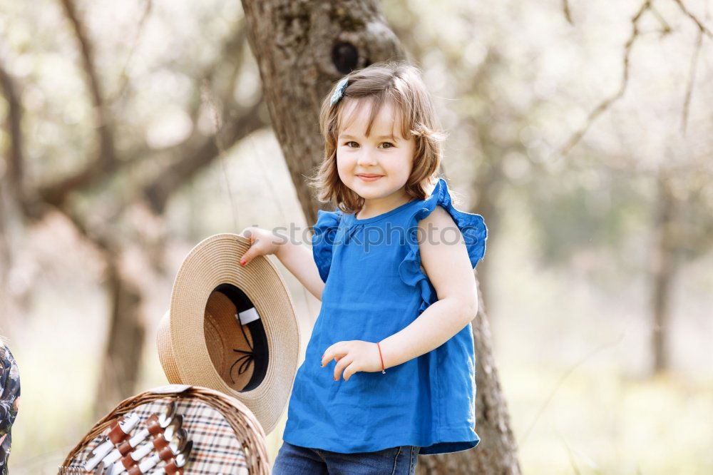 Similar – Image, Stock Photo Grandmother with her grandchildren sitting in the field