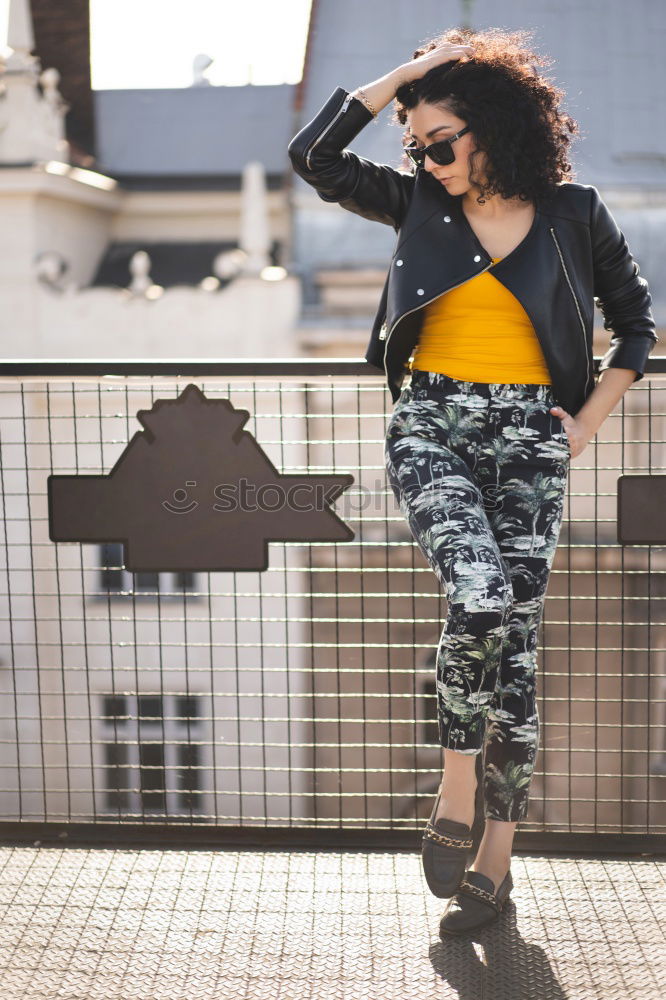 Similar – Afroamerican woman in urban street. Afro hairstyle.