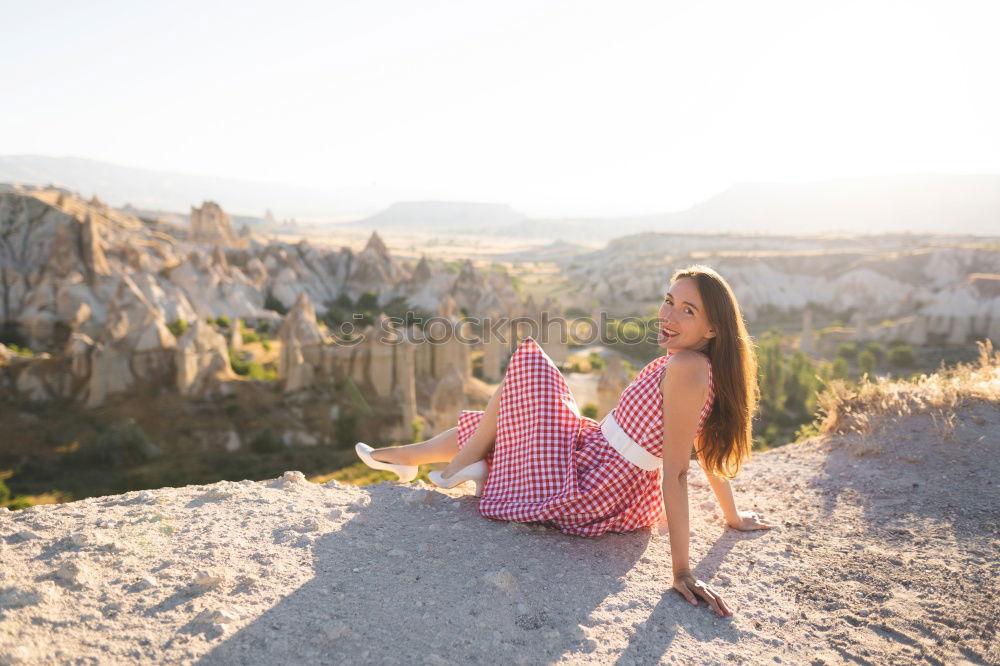 Similar – Stylish woman on picturesque landscape