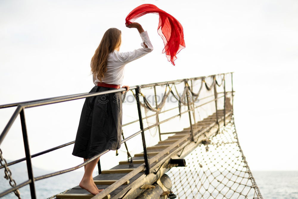 Similar – Woman with the hair flying in the air because of the wind