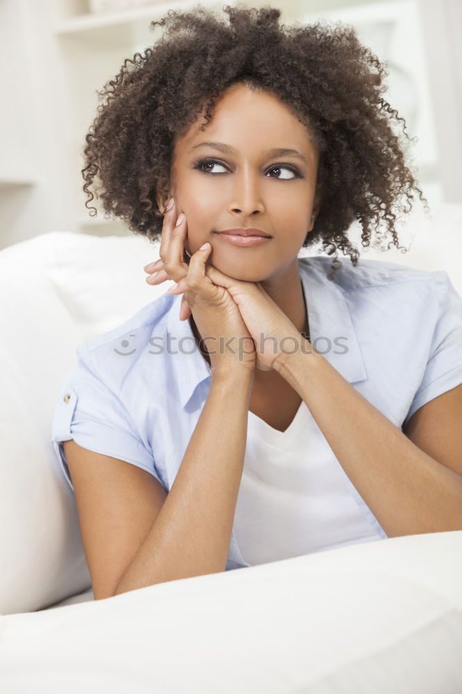 Similar – Image, Stock Photo Portrait of a young thoughtful mixed race man sitting in the sofa