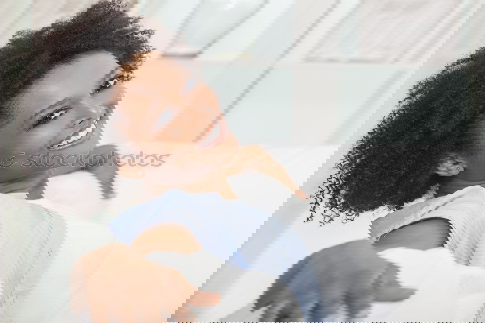 Similar – Image, Stock Photo Portrait of a young thoughtful mixed race man sitting in the sofa