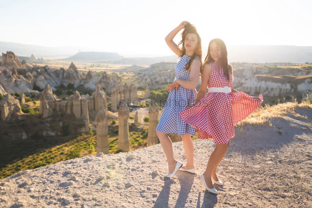 Similar – Happy women walking on hill