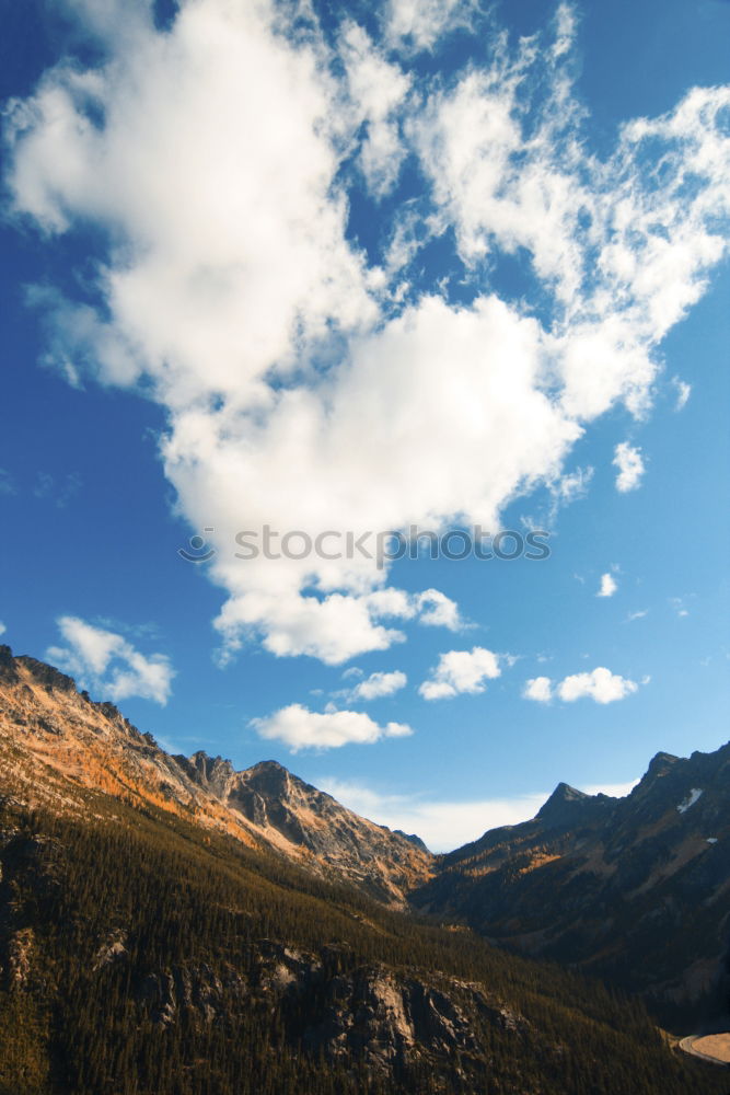 Similar – Image, Stock Photo Clouds and shadows in the Dolomites portrait