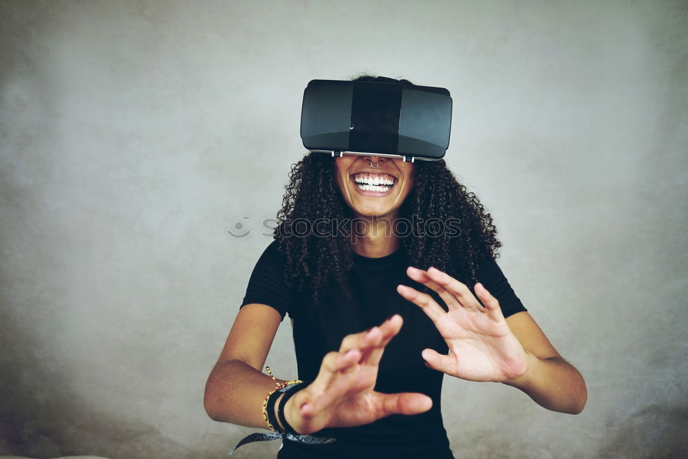 Image, Stock Photo young black woman wears virtual reality VR headset