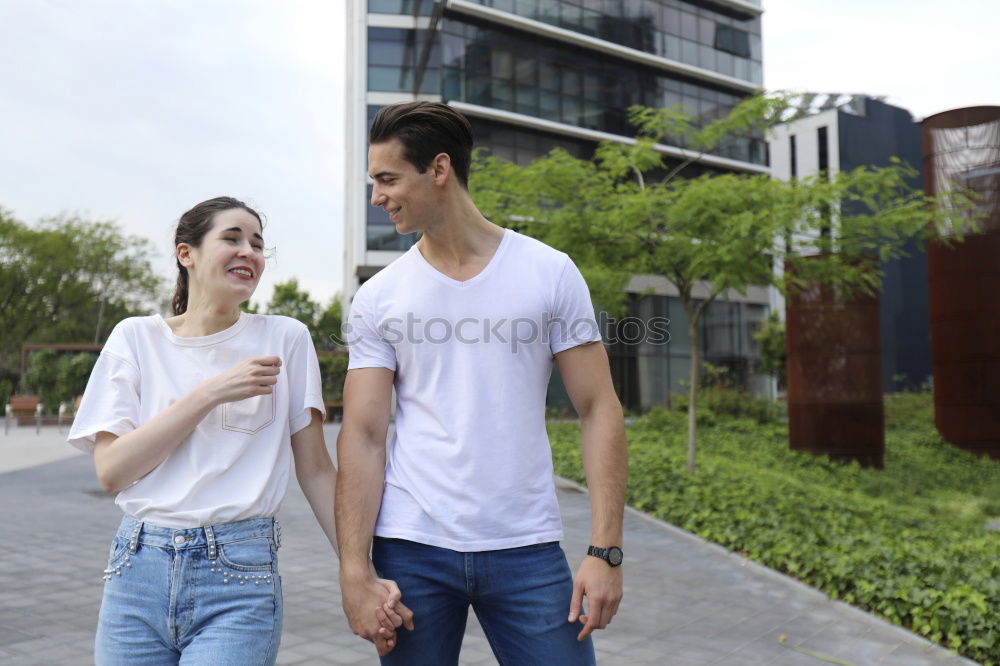 Young beautiful couple posing wearing jeans and t-shirt