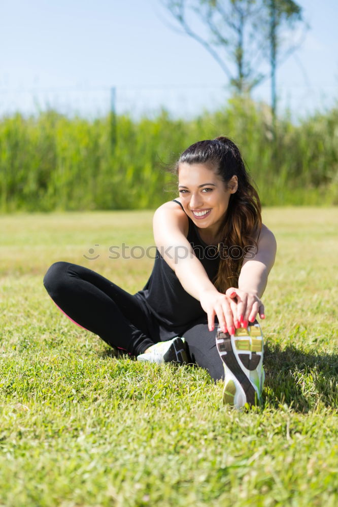 Image, Stock Photo Woman warming up before outdoor workout