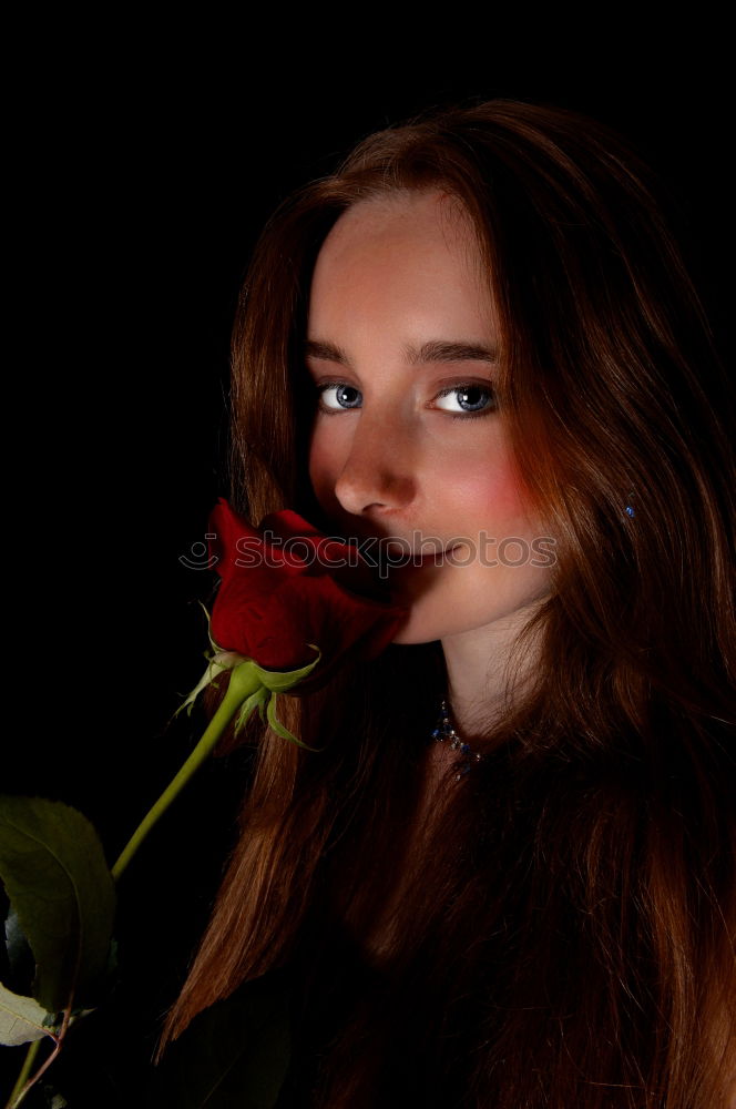 Similar – Pretty woman standing with white flowers