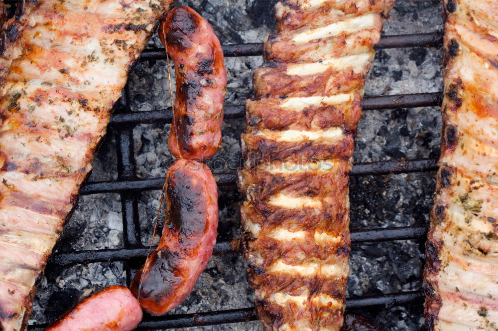 Similar – Image, Stock Photo BBQ bratwurst belly zucchini