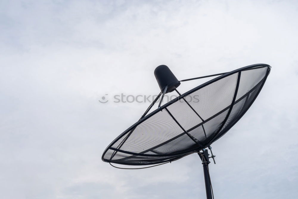 Similar – Satellite dish on the roof of a car