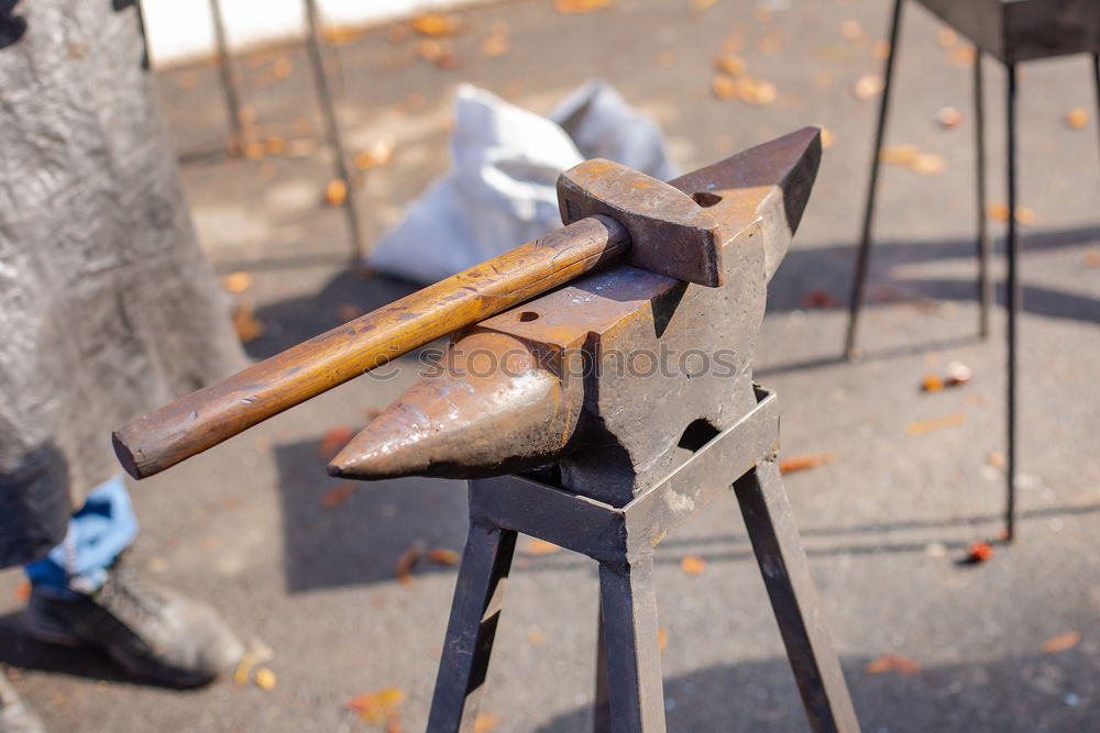 Similar – Image, Stock Photo Old hammer and anvil in a forge