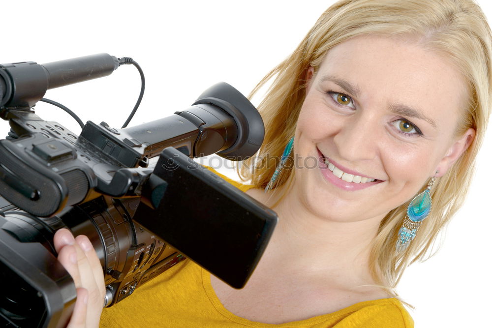 Similar – Young woman taking pictures with an instant camera