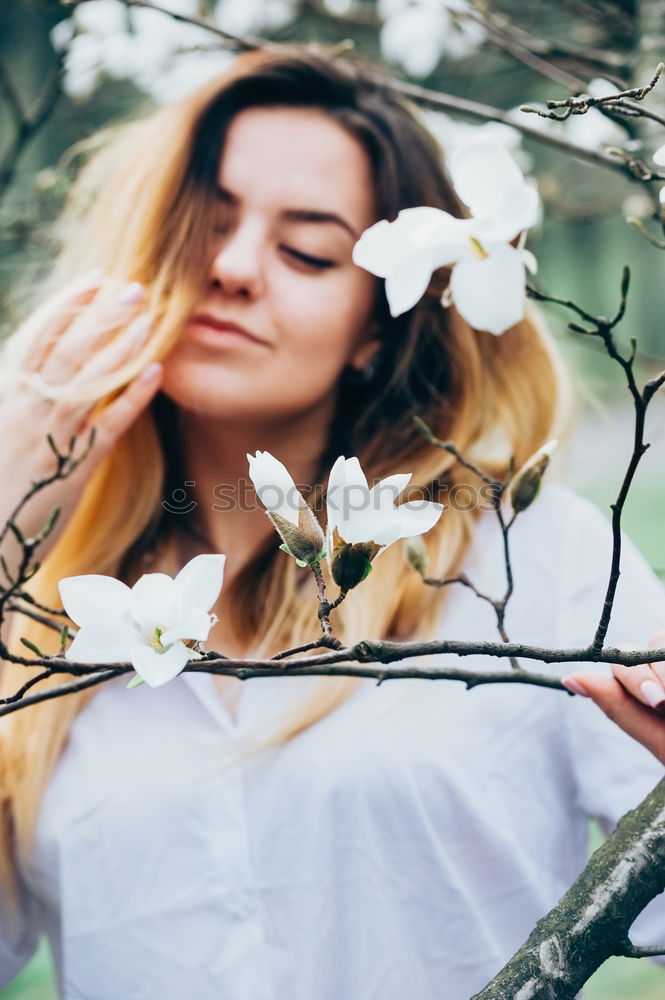 Similar – Happy young black woman surrounded by flowers