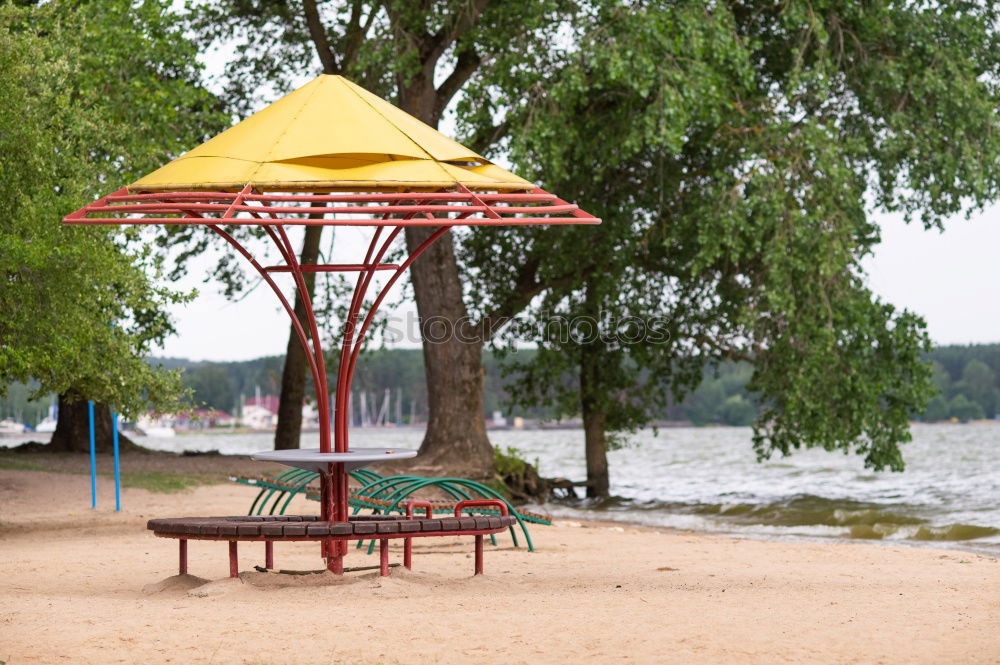 Similar – Leerer, geschlossener Biergarten mit schöner Aussicht und Baum.