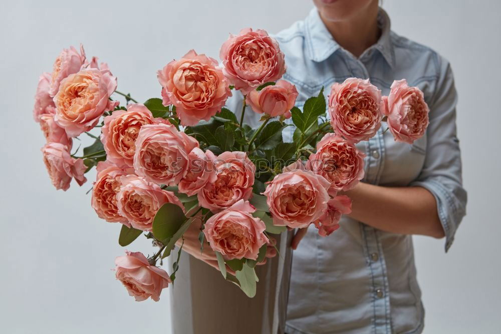 Similar – Image, Stock Photo Portrait of woman holding bouquet of flowers