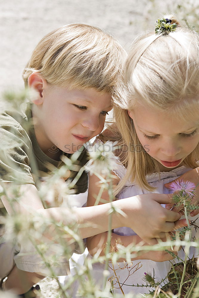 Similar – Image, Stock Photo Dad teaching daughter about nature