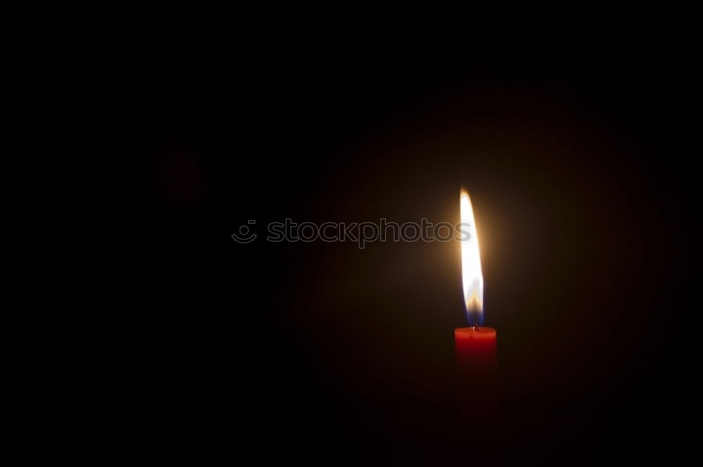 Similar – light a candle for Candle