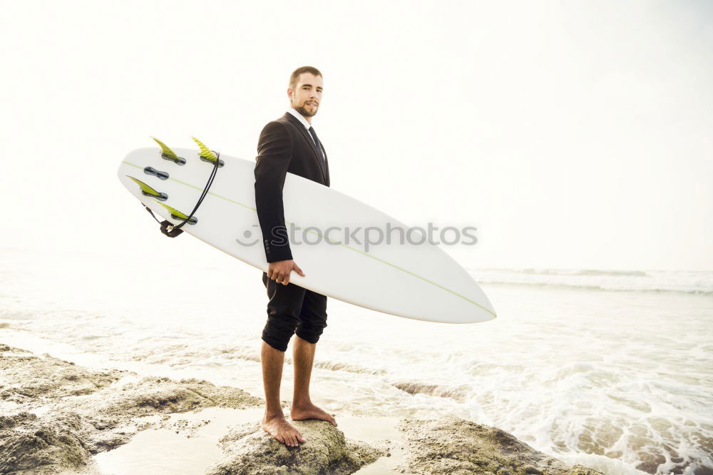 Similar – Tattooed man holding skateboard