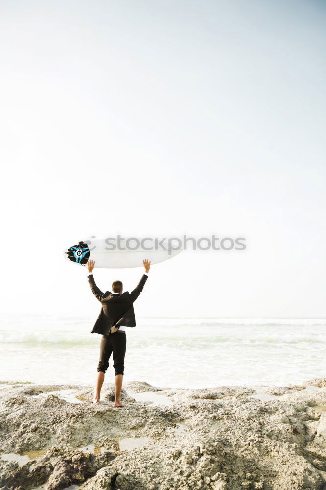 Similar – Diver in shallow water preparing to swim