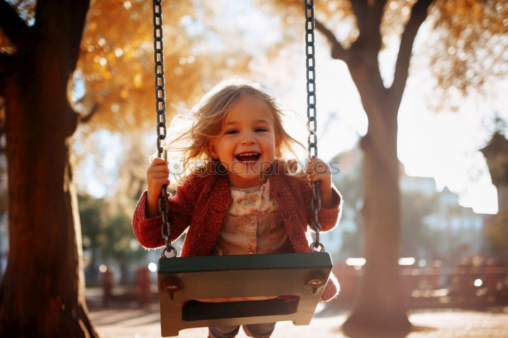 Similar – Little caucasian girl having fun on slide on playground