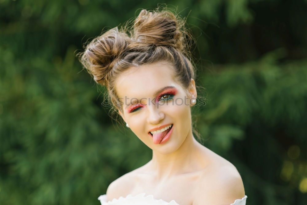 Similar – Pretty woman standing with white flowers