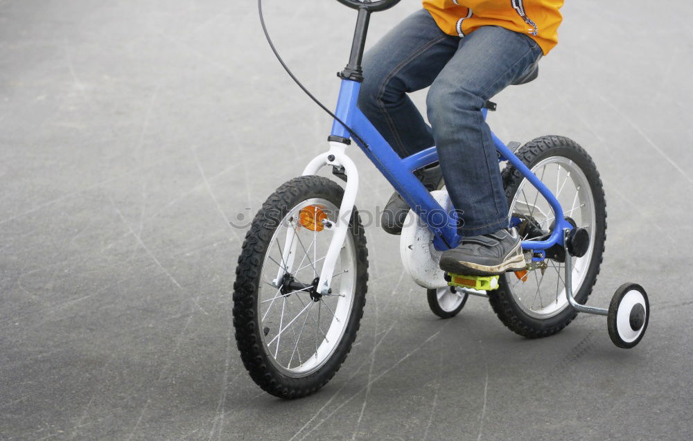 Similar – Junge fährt mit dem Fahrrad zur Rampe