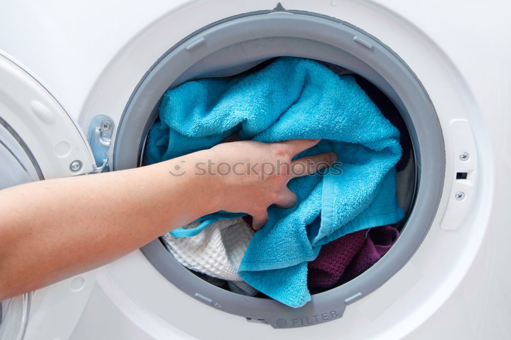 Similar – Face mask in a washing machine, hygiene, disinfection