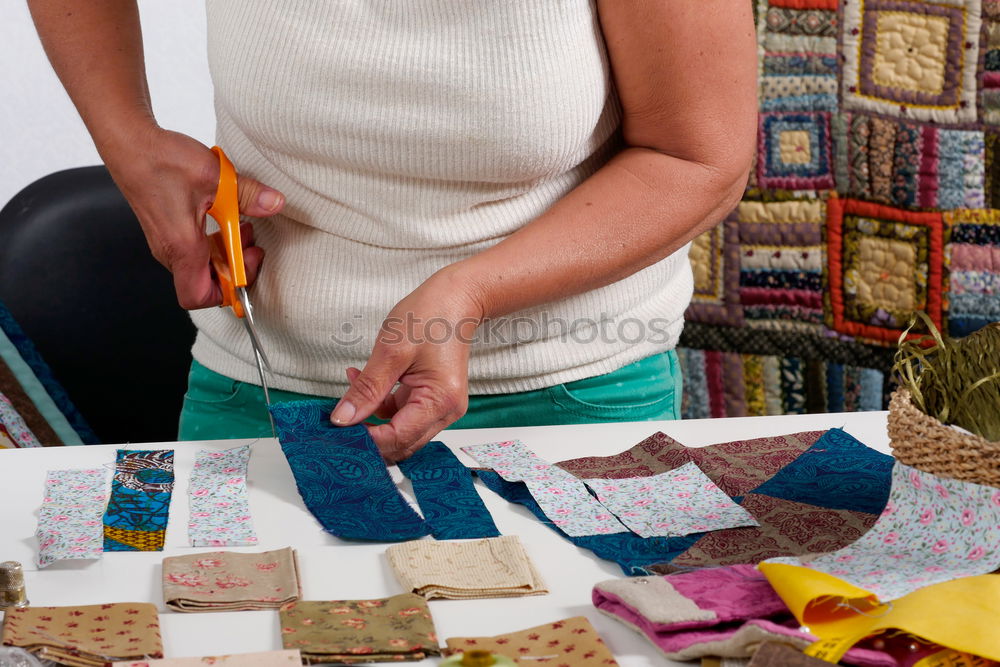 Similar – Senior woman sewing protective masks at home