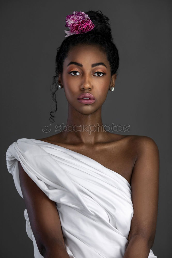 Similar – Image, Stock Photo Beautiful serious thoughtful and sad black woman covering her head with sheet in bed