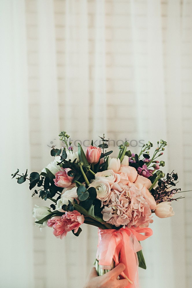 Similar – Female hand with roses bouquet of flowers