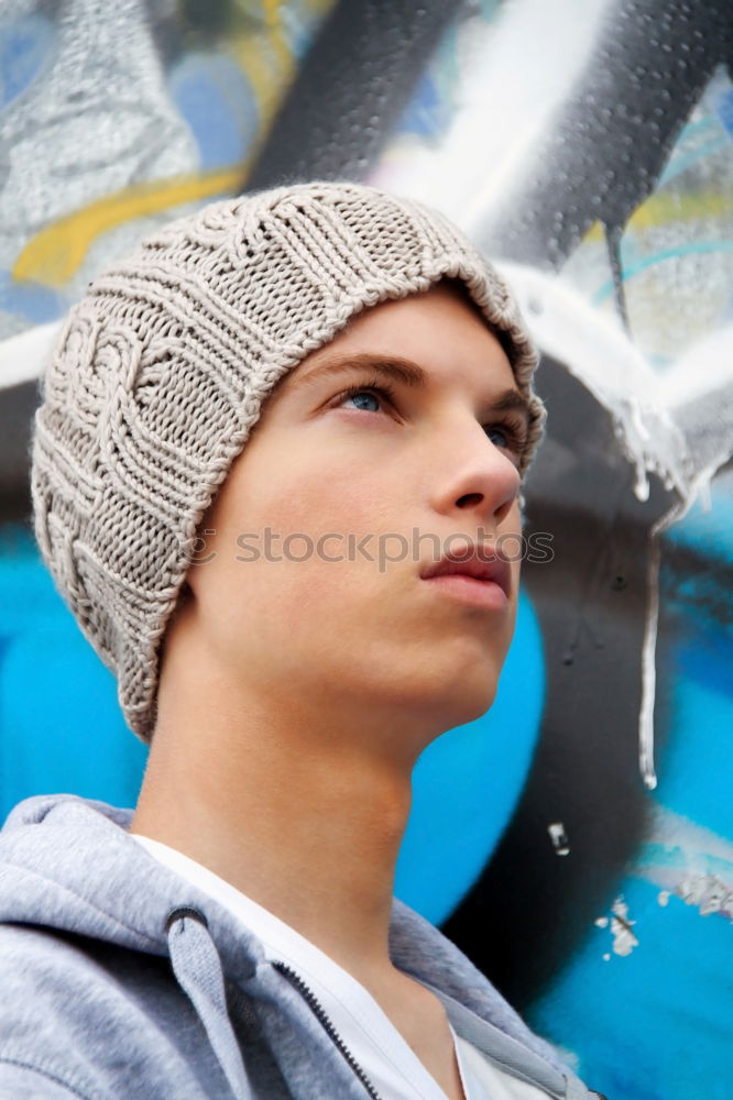 Similar – Image, Stock Photo teenager with hoodie leaning against a tractor tire