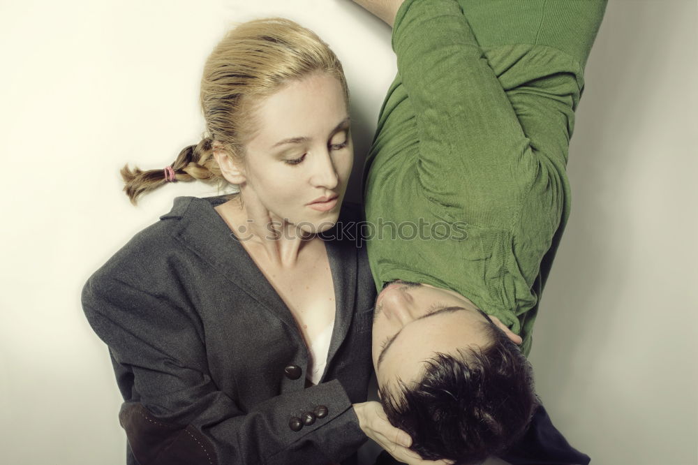 Similar – Two young women lie casually together on a bed with heads and look into the camera