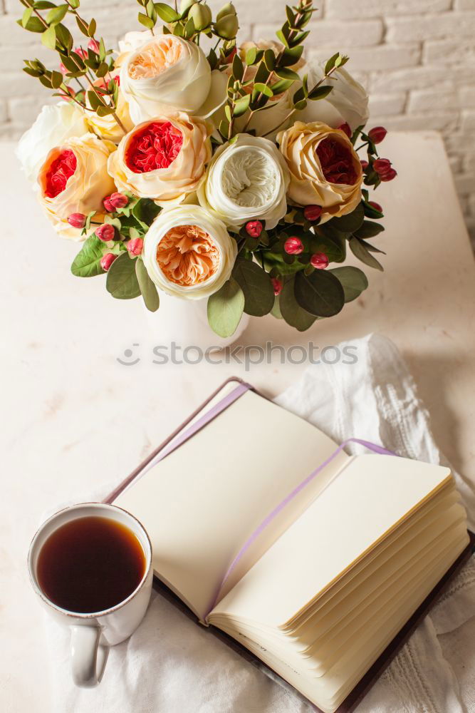 Similar – Crop hands holding flowers near honey and tea