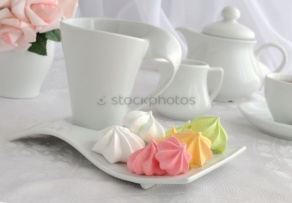 Similar – Crockery arrangement with flower