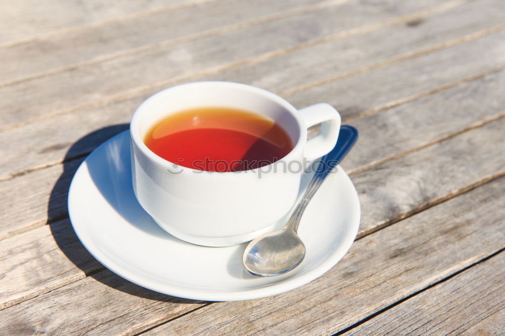 Similar – Image, Stock Photo Two woman hands holding empty finished cup of black tea