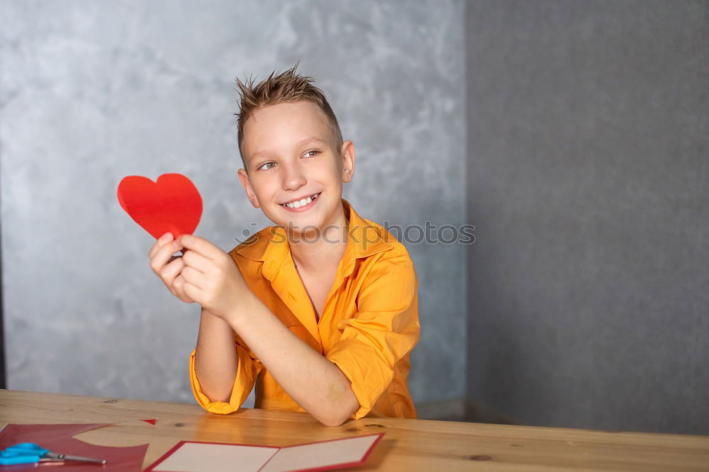 Similar – Image, Stock Photo Boy with chalk doesn’t want hate but love