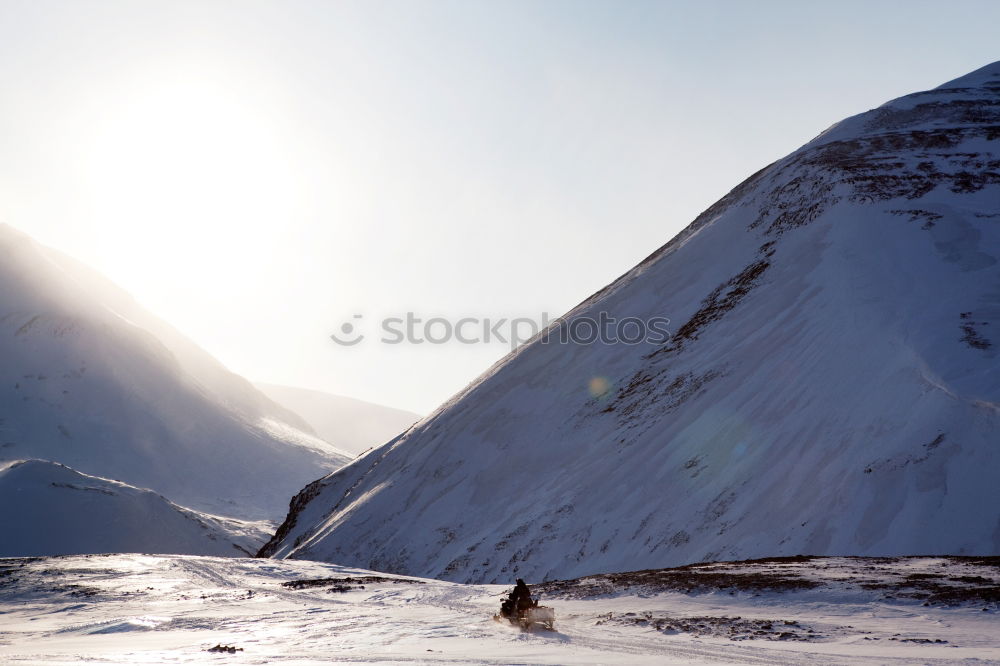 Similar – Tourist standing in mountains