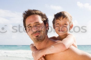 Similar – Image, Stock Photo Father and son playing on the beach