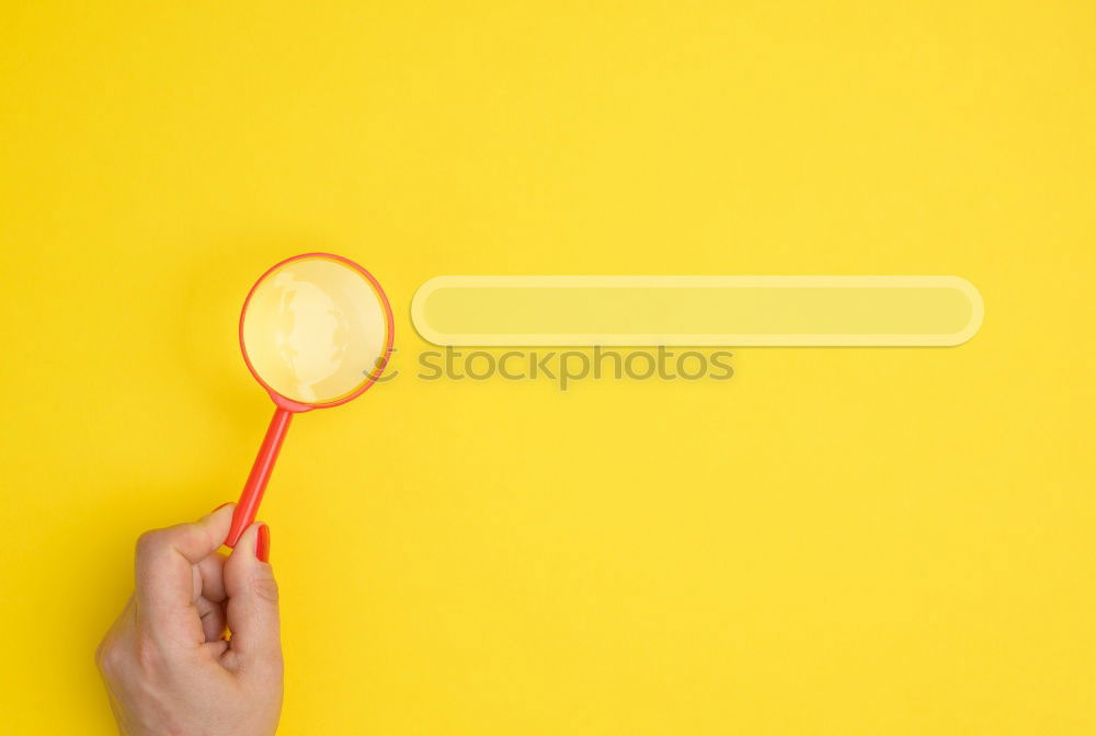 Similar – Image, Stock Photo Forearm and hand with pencil against a yellow background