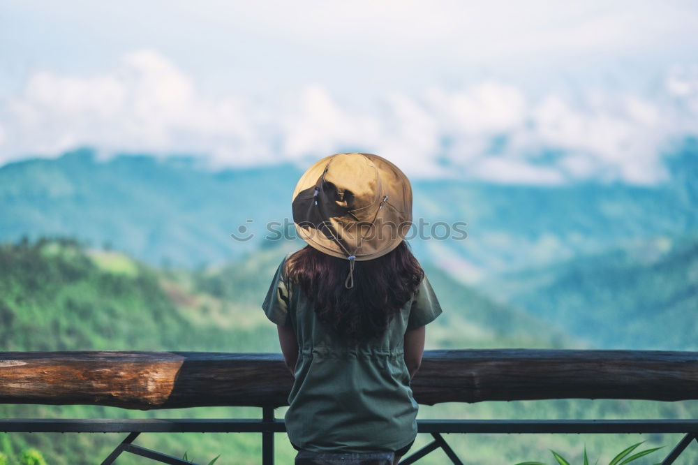 Similar – Woman in hat in nature